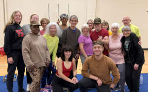 Neva, Madison, and Theresa posing with their Active Aging & Rehabilitation Lab Participants.