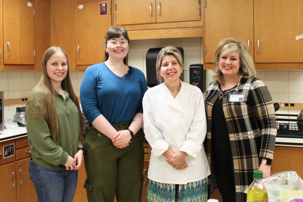 YSU Dietetics students, a registered dietitian, and a Mercy Health healthcare professional during a bariatric cooking class.